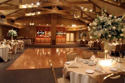 bride and groom on lawn